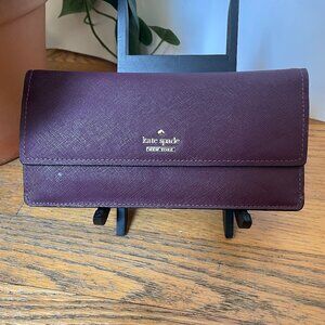 Kate Spade Large bi- Fold wallet in Deep Plum
